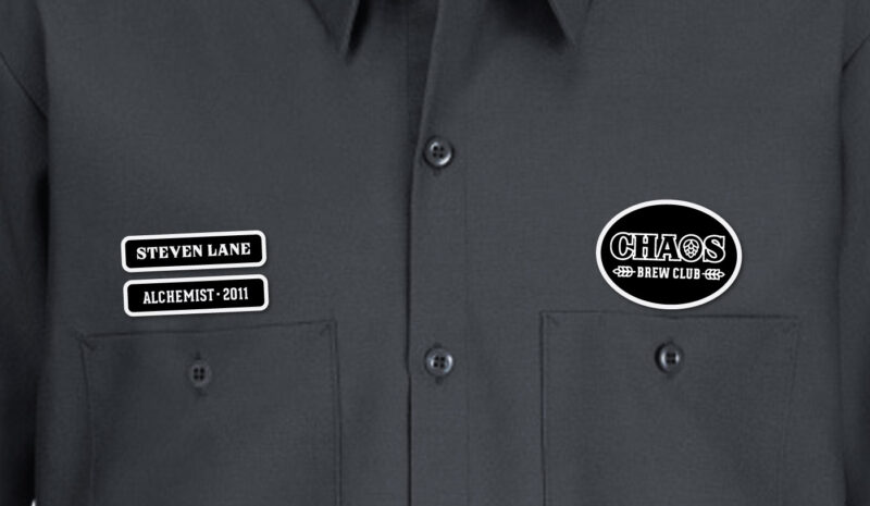 Mockup image of the CHAOS Work Shirt '23 front patches